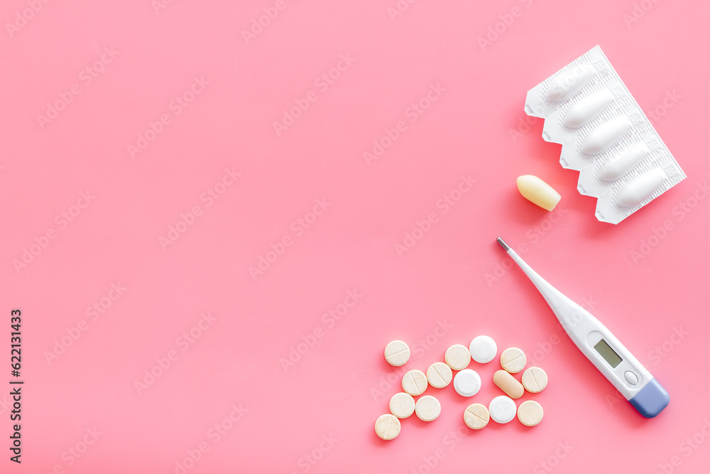 Medical treatment concept with thermometer pills and rectal suppositories Medical treatment concept with thermometer pills and rectal suppositories