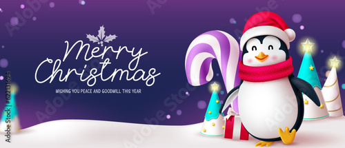 Merry christmas text vector design. Christmas greeting card with penguin character and candy cane elements in frost snow background. Vector illustration seasonal invitation background.