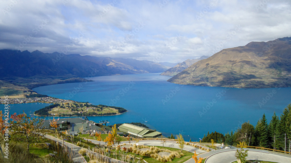 view of lake from the mountains in queenstown, new zealand