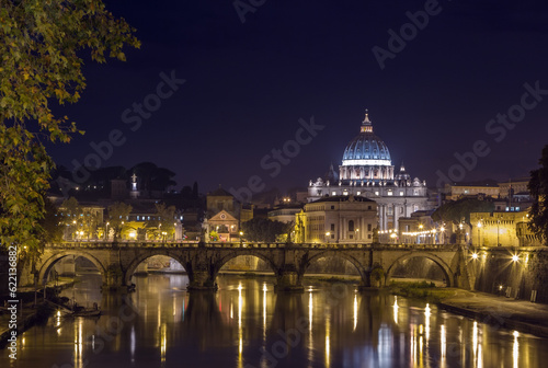 view of Ponte Vittorio Emanuele II and St. Peter's Basilica in evening, Rome
