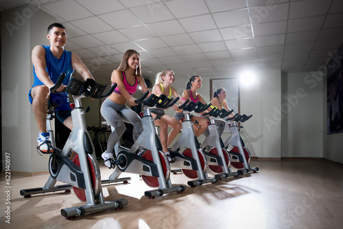 Young people on cycle indoors