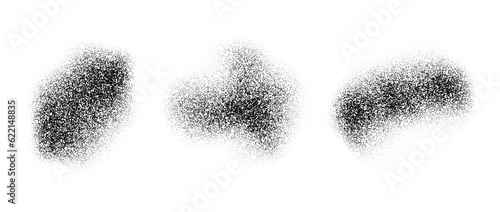 Abstract fluid dotted gradients stains. Noise grain texture shapes set. Black stippled spray splashes and sand dust spots. Dotwork elements and halftone splatter forms collection. Vector