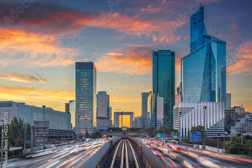 Image of office buildings in modern part of Paris- La Defense during beautiful sunset.