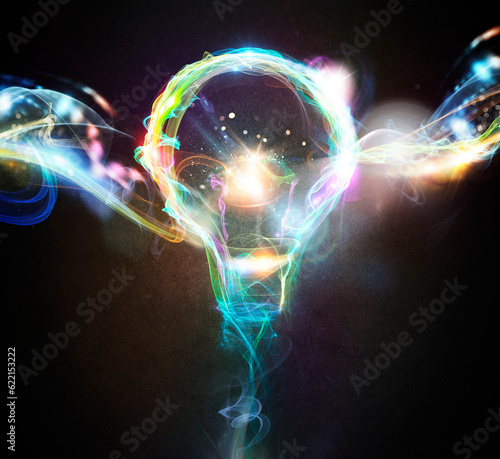 Fotografie Light bulb drawn with colourful lighting effects