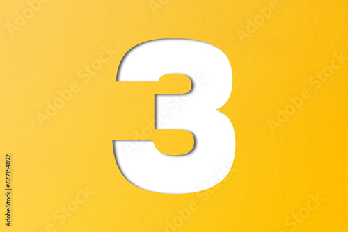 number cut paper 3 yellow isolated on transparent background