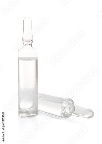 Medical ampules on white ba...