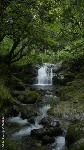 Fototapeta Naklejka Na Ścianę i Meble -  Waterfall deep in the mountains