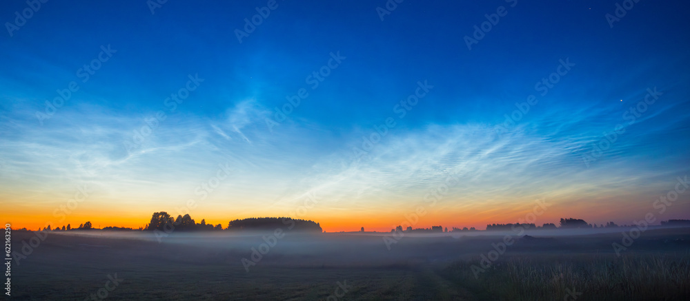 Fototapeta premium Night landscape with Noctilucent clouds at Lithuania