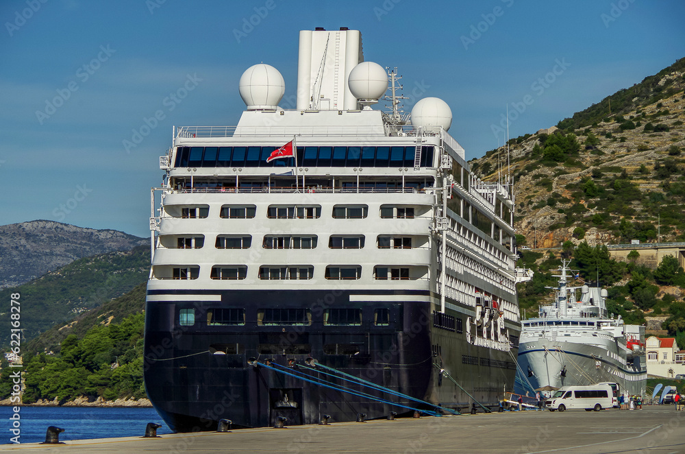 Naklejka premium Luxury Azamara cruiseship cruise ship liner Journey, Quest, Pursuit or Onward in port of Dubrovnik, Croatia on sunny day during Adriatic Mediterranean cruising 