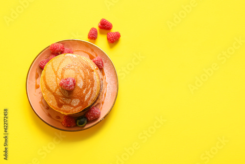 Plate of tasty pancakes wit...