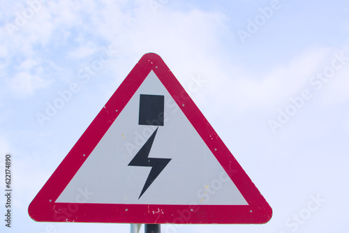 High power transmission line danger road traffic triangle sign isolated