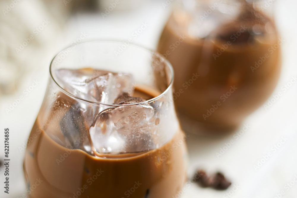 Refreshing iced latte coffee in a glass Refreshing iced latte coffee in a glass