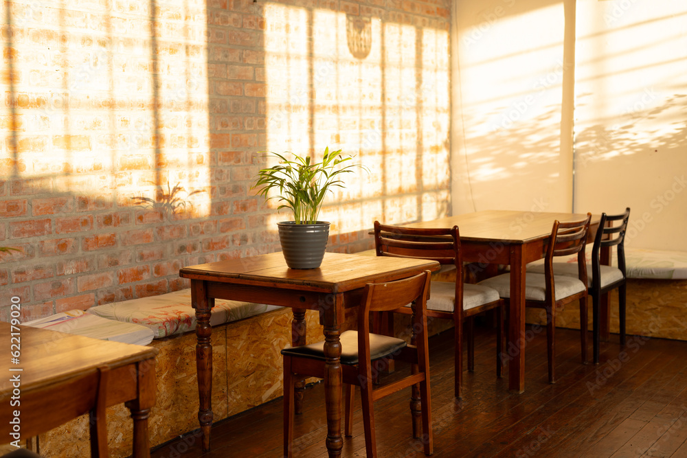 Close up of tables and chairs in sunny cafe Close up of tables and chairs in sunny cafe