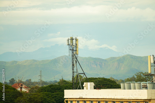 telecommunication tower mobile phone communication repeater antenna on the building