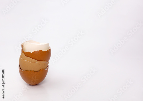 Broken or cracked egg shell isolated on white background.