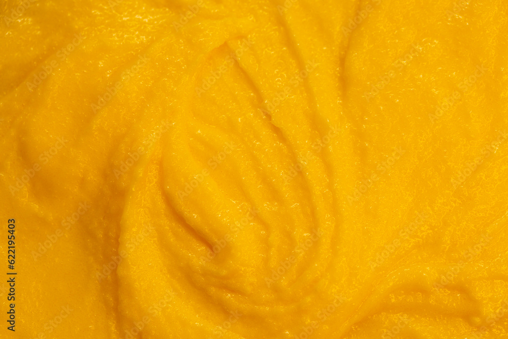 Fruit yogurt ice cream. Smoothies from fresh fruits and berries. Ice cream texture. Delicious sweet dessert close-up as a background. Fruit yogurt ice cream. Smoothies from fresh fruits and berries. Ice cream texture. Delicious sweet dessert close-up as a background.