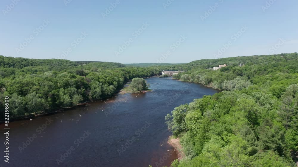 Low aerial shot flying over the Saint Croix River towards Saint Croix Falls, Wisconsin. 4K Low aerial shot flying over the Saint Croix River towards Saint Croix Falls, Wisconsin. 4K