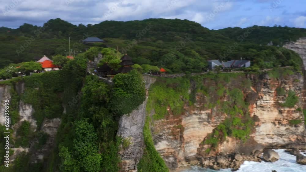 Scenic View Of The Uluwatu Temple In Bali, Indonesia - aerial shot Scenic View Of The Uluwatu Temple In Bali, Indonesia - aerial shot