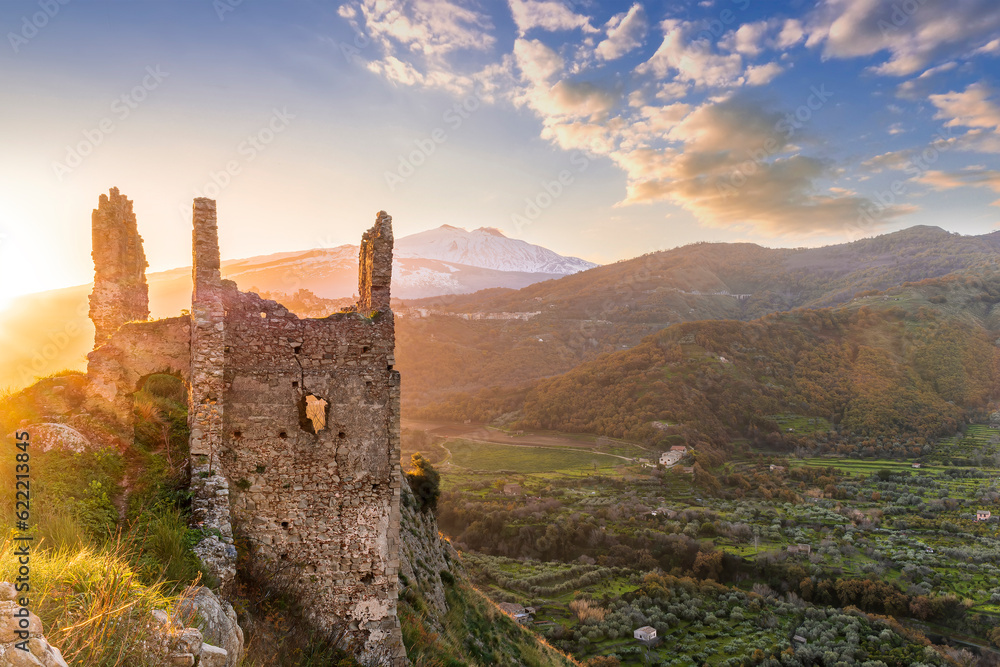 beautiful sunset or sunrise landscape of ancient ruins on a top of a hill with green mountains with white snow top on background beautiful sunset or sunrise landscape of ancient ruins on a top of a hill with green mountains with white snow top on background
