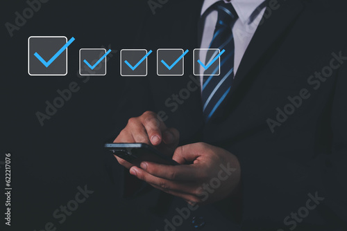 businessman checklist, correct mark for document approval, project acceptance and quality assurance concept, assessed, questionnaire, evaluation, online survey, 