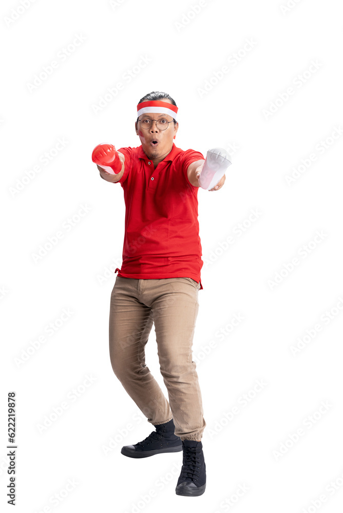 Indonesian man supporting Indonesian team when competing Indonesian man supporting Indonesian team when competing