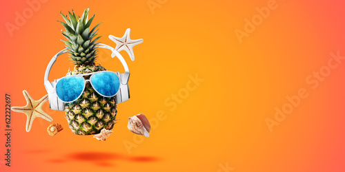 Cheerful pineapple with headphones