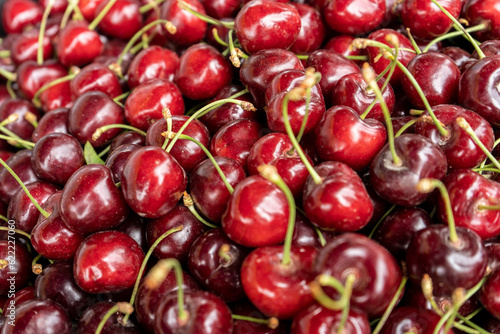 a group of cherry in dark red colour