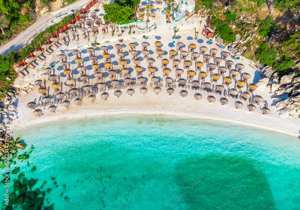 Beach with turquoise sea and umbrellas. Marble Beach, Thassos, Greece