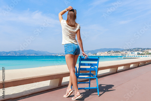 Obraz na płótnie Tourist woman on Croisette beach. Cannes, Cote d'Azur, France, Europe w salonie