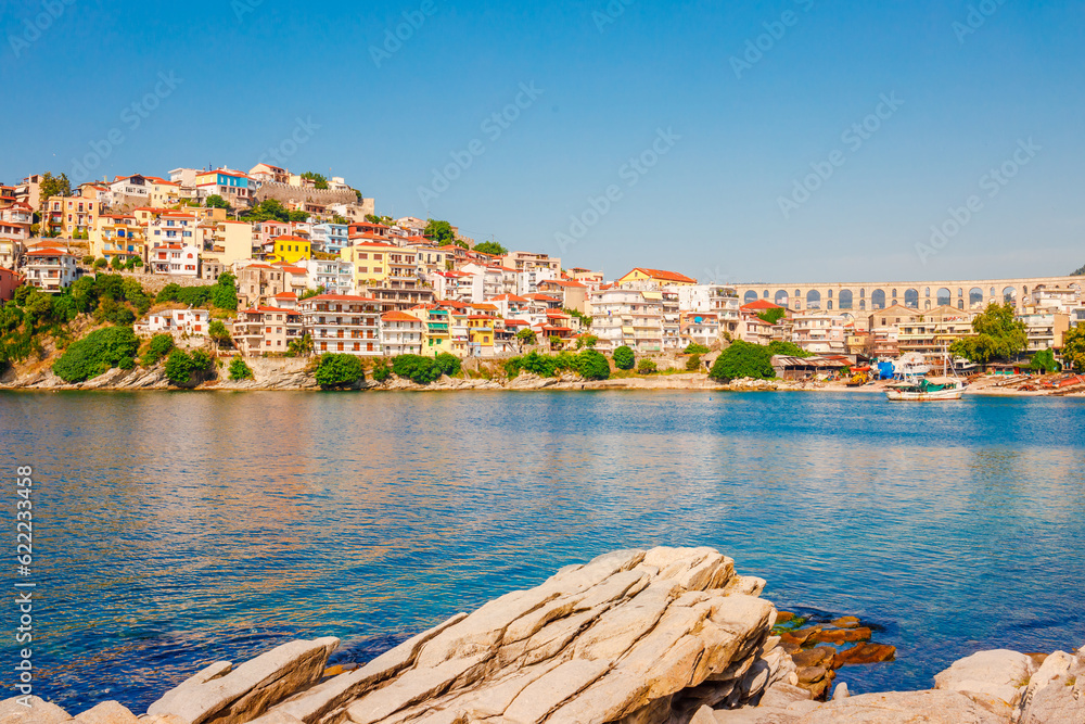 Ancient aqueduct and cityscape in Kavala, Macedonia, Greece, Europe