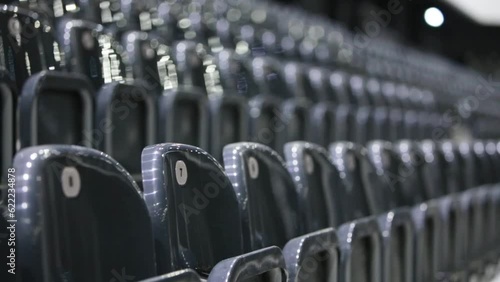 Empty sports and concerts hall. Seats row, lateral view