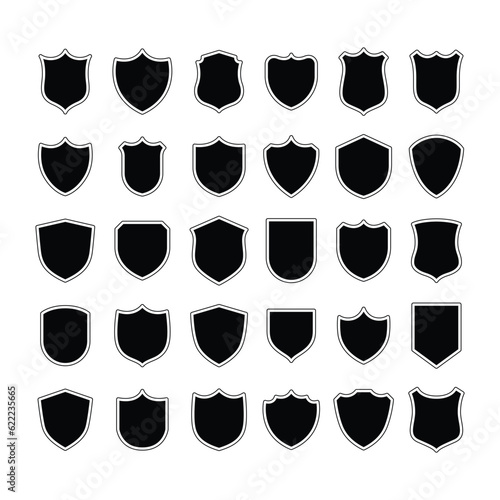 set of black shield badges vector icons