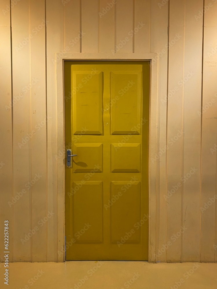 Photo of yellow wooden door Photo of yellow wooden door