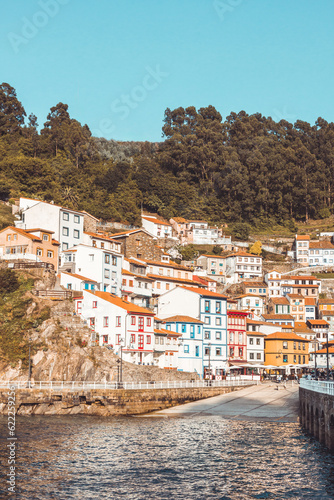 Cudillero, beautiful and touristic fishing village located in Asturias, vertical shot, copy space, travel concept, vacations, summer.