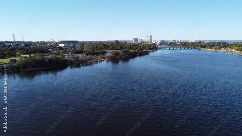 Drone shot sideways across Swan River view of Crown Casino Burswood, Optus Stadium to skyline of Perth, Western Australia Drone shot sideways across Swan River view of Crown Casino Burswood, Optus Stadium to skyline of Perth, Western Australia