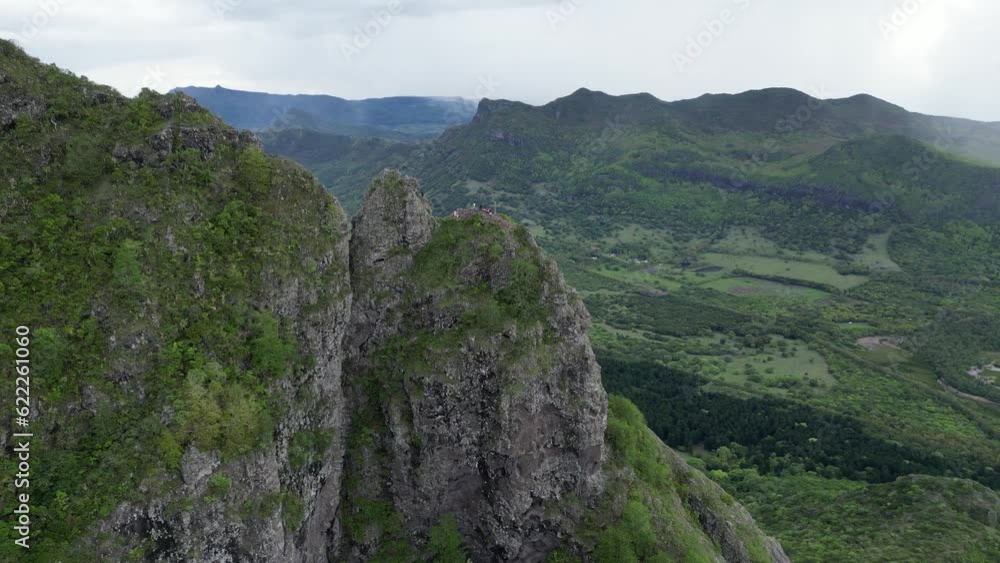 People on the mountain top in Mauritius, aerial mountain landscape People on the mountain top in Mauritius, aerial mountain landscape