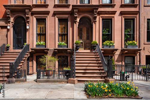 Row of townhouse entrances with stoop steps. Brownstones in Brooklyn Heights, New York City photo