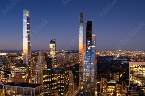 Fototapete Aerial view of Billionaires' Row skyscrapers in Midtown Manhattan at dusk with view of Central Park