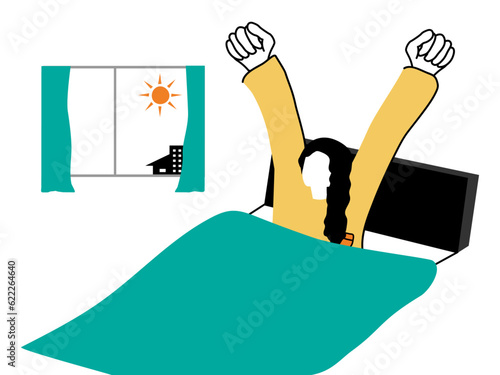 起床して布団で背伸びする女性