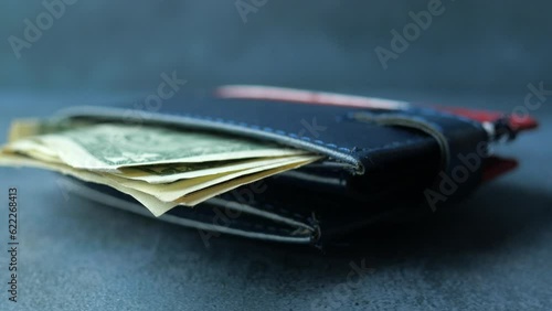 Wallpaper Mural Close up of cash in wallet on table. Torontodigital.ca