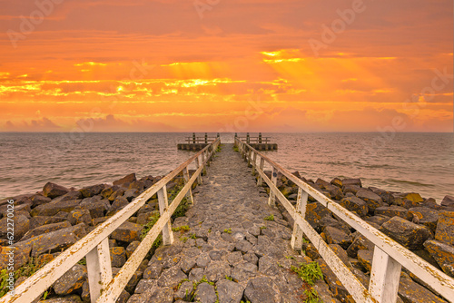 Pier in water of lake IJsselmeer