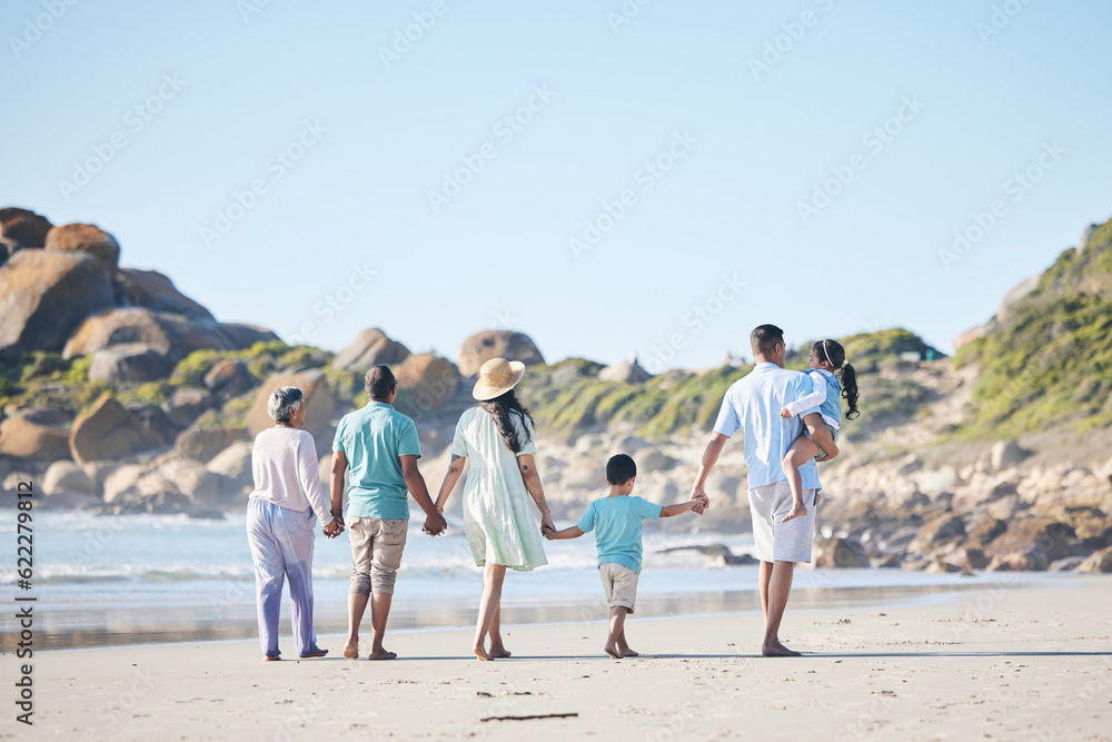 Beach, walking and grandparents, parents and children by sea for bonding, quality time and relax in nature. Family, travel and back of mom, dad and kids by ocean on holiday, vacation and adventure