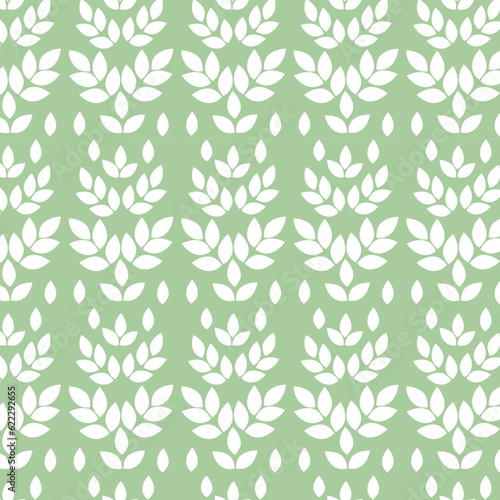 Seamless pattern of white leaves on a green background. Complex leaves, filling without contour. Background for paper, cover, fabric, interior decor.