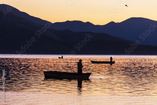 Fisherman on sunrise