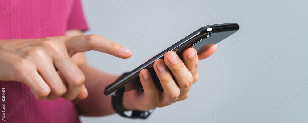 Hand holding smartphone on white background. Hand holding smartphone on white background.