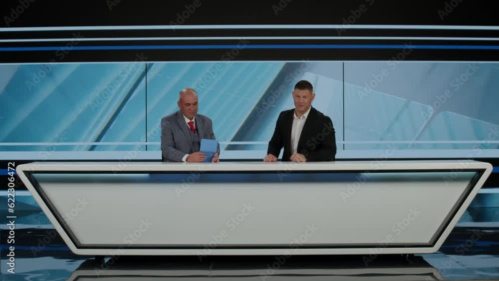 BEHIND THE SCENES BTS Positive co-hosts having a conversation after finishing TV style broadcast morning talk show