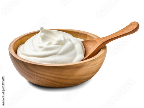 Photo Sour cream in wooden bowl and spoon, mayonnaise, yogurt, isolated on transparent