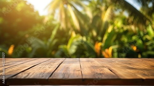 Empty wooden table top with blur background of Green Garden