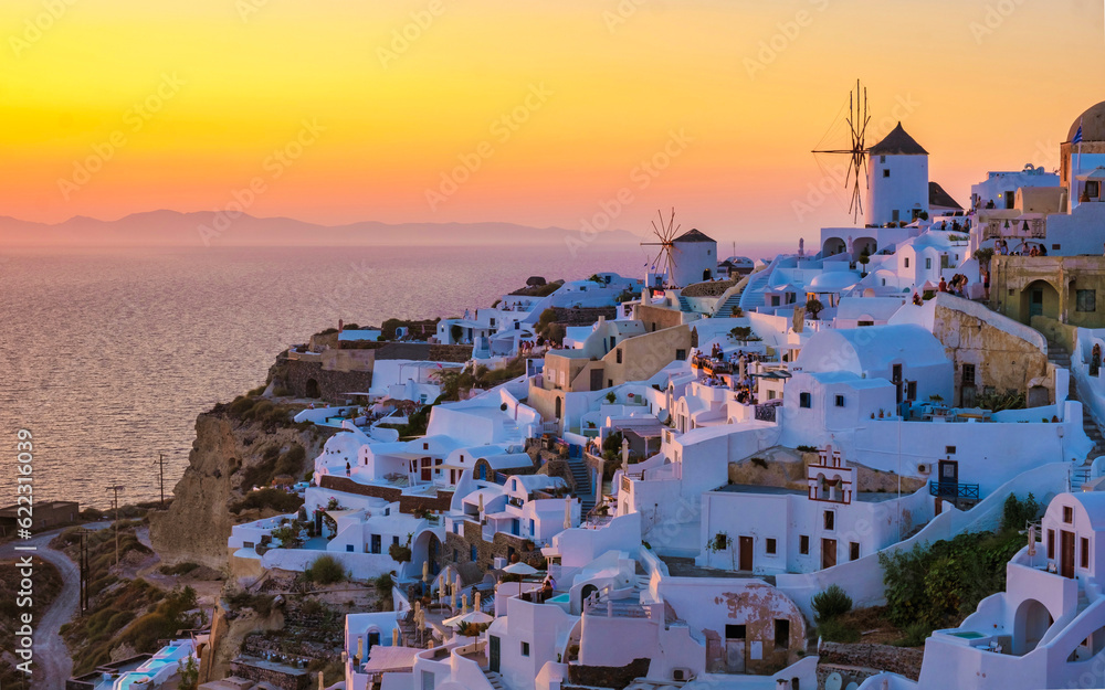 Sunset at the Greek village of Oia Santorini Greece with a view over the ocean caldera of Santorini