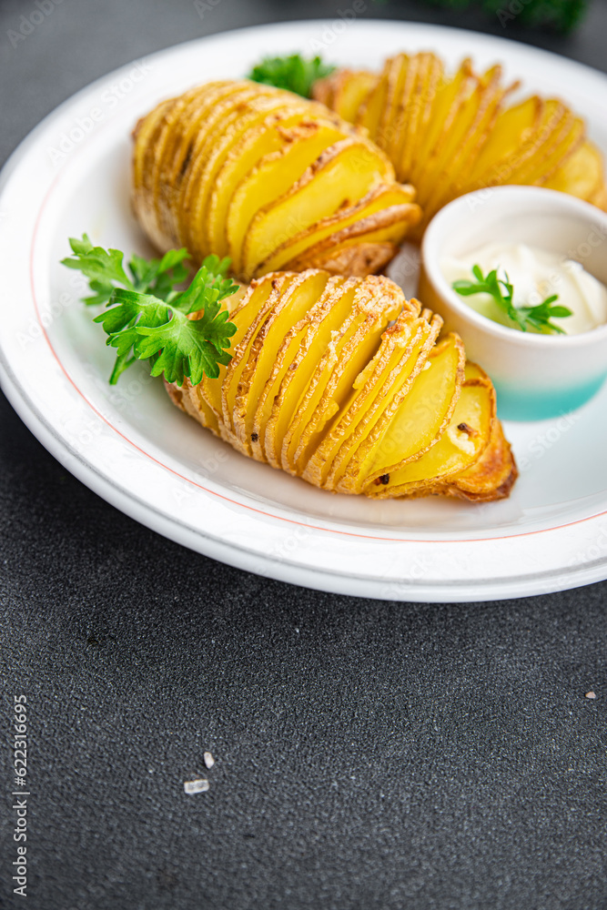 baked potato slice accordion vegetable meal food snack on the table copy space food background rustic top view baked potato slice accordion vegetable meal food snack on the table copy space food background rustic top view